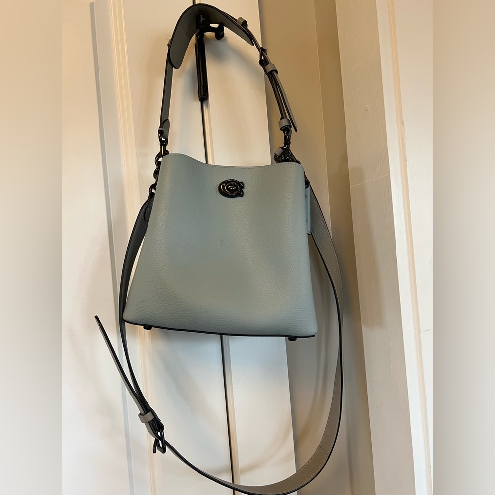 Coach Mollie bucket bag. Light blue with gray straps.